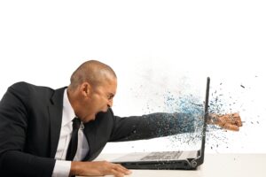 Concept of stress and frustration of a businessman with laptop