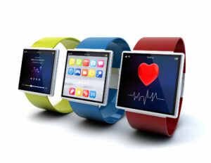 wearable device technology concept: collection of color digital smart watches with apps on the screen isolated on white background